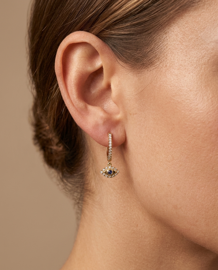 Round Diamond Huggie/Hoop Dangling Evil Eye Earrings in Yellow Gold on model