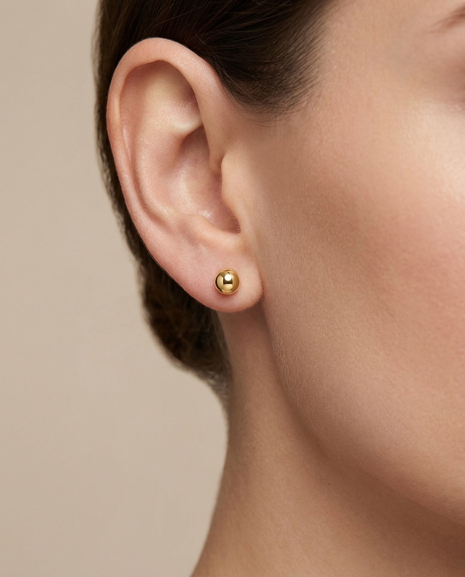 Ball Earring in Yellow Gold on model