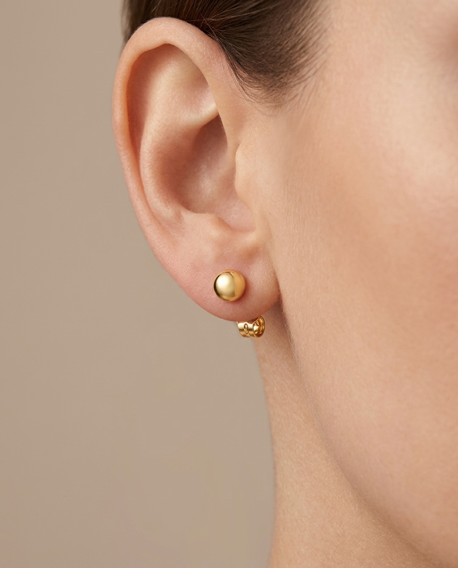 Ball Earring in Yellow Gold on model