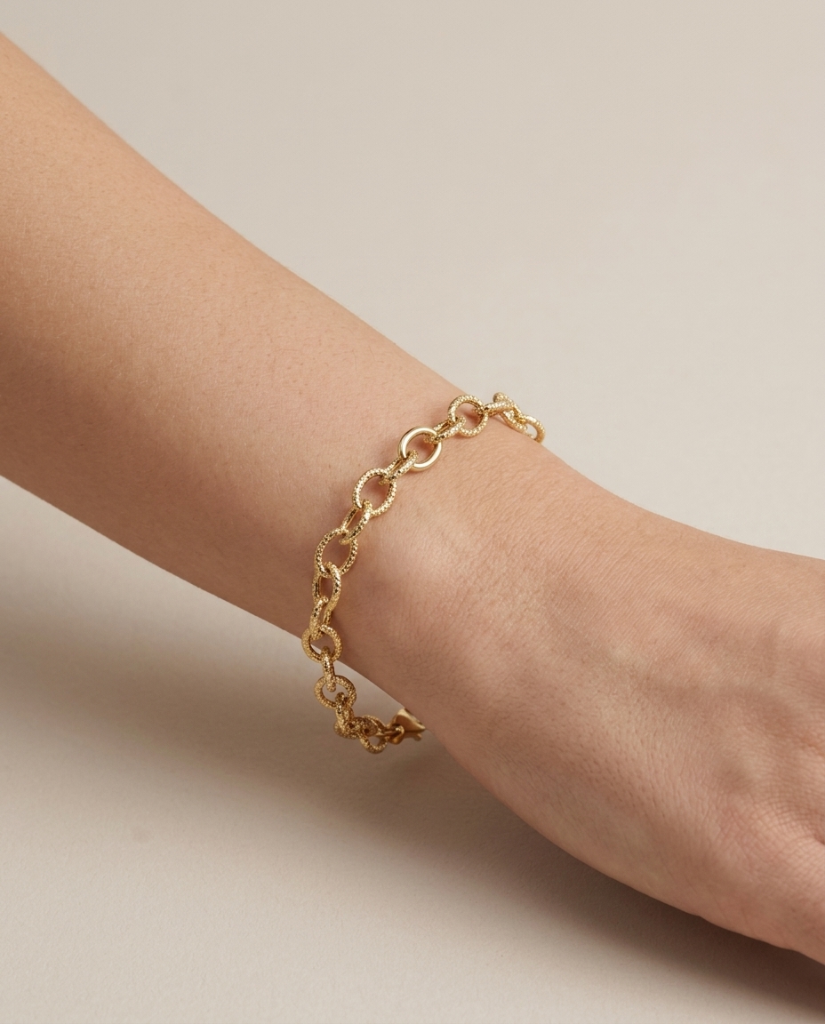 14KT Gold Oval Link Bracelet on model