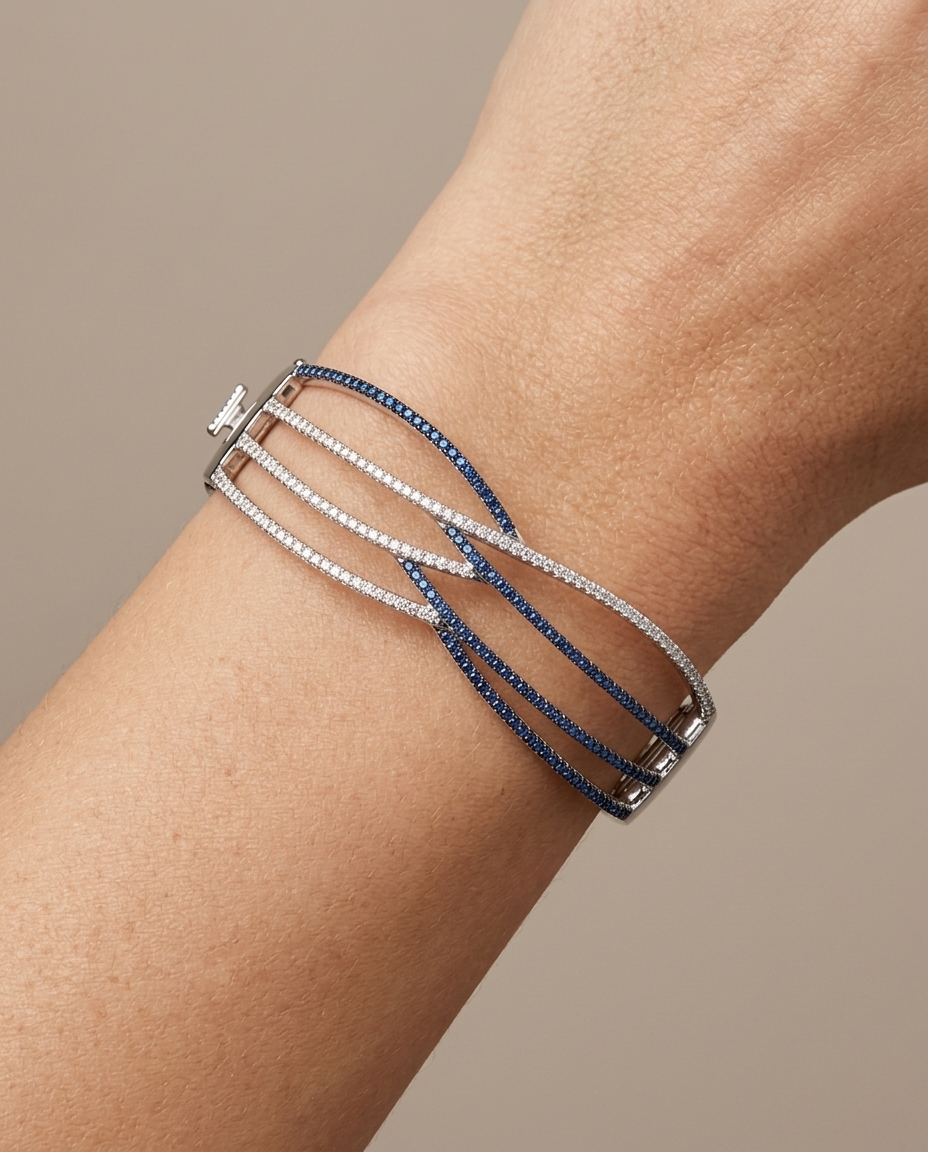 14KT White Gold White and Blue Diamond Bangle on model