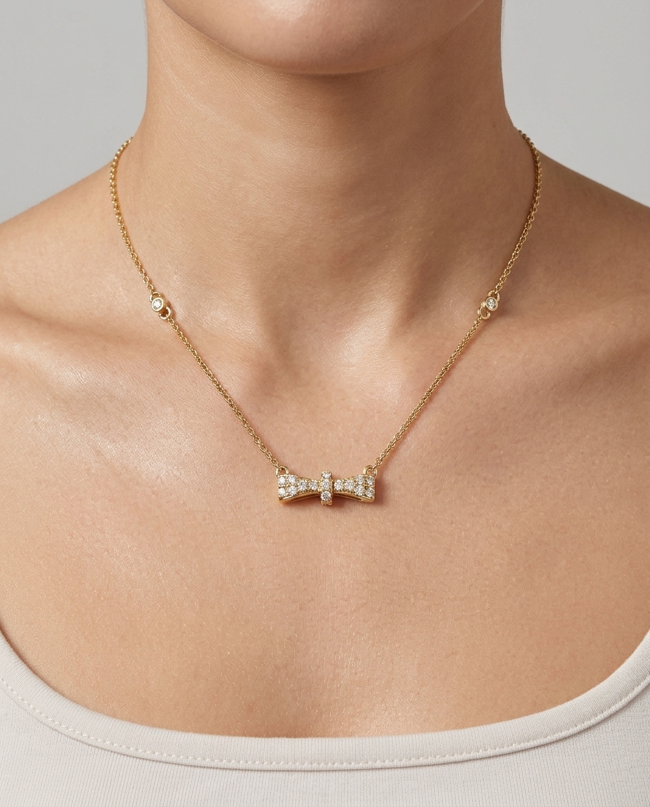 14KT Yellow Gold Diamond Bow Necklace on model