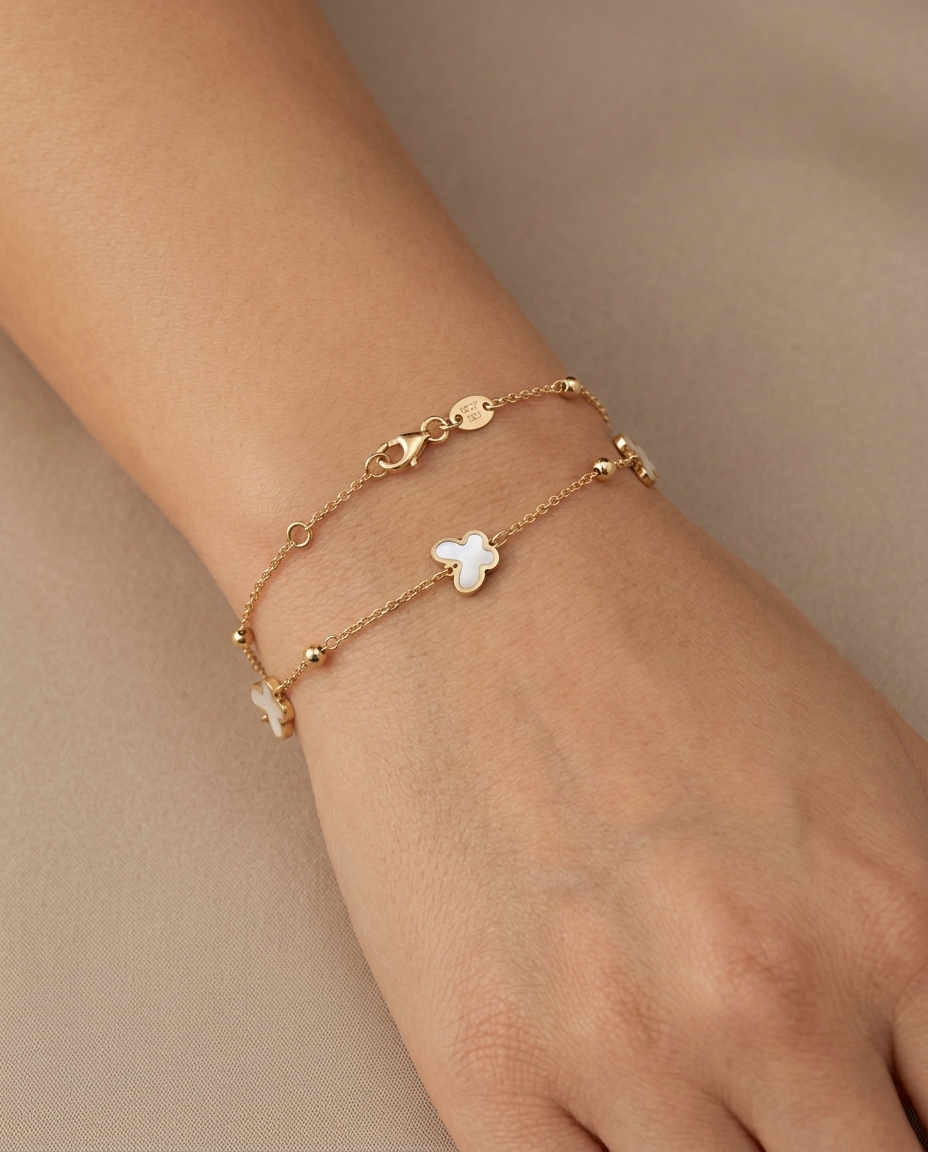 14KT Yellow Gold Mother of Pearl Butterfly Ball Bracelet 7" on model