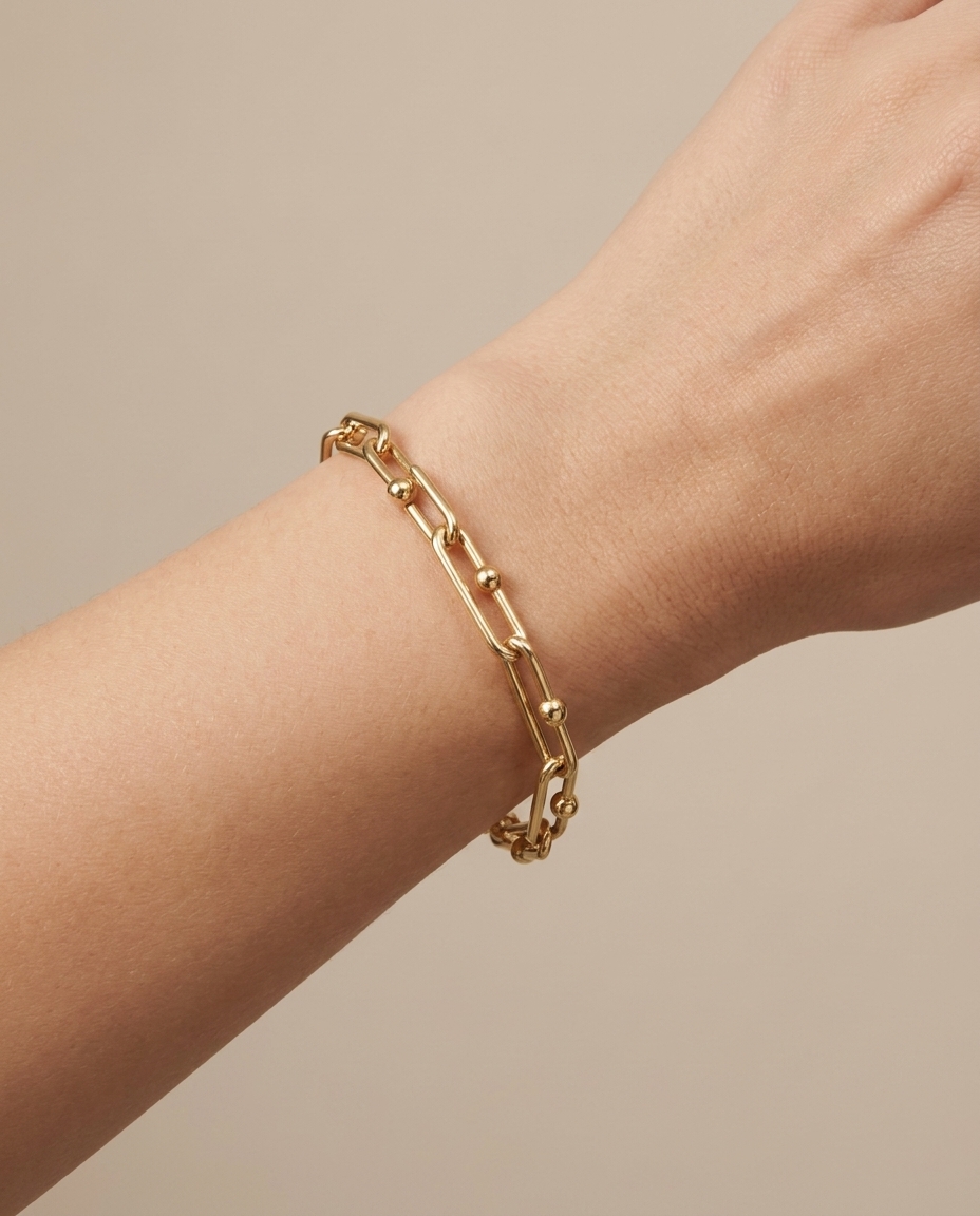 14KT Yellow Gold Paperclip Braclet on model