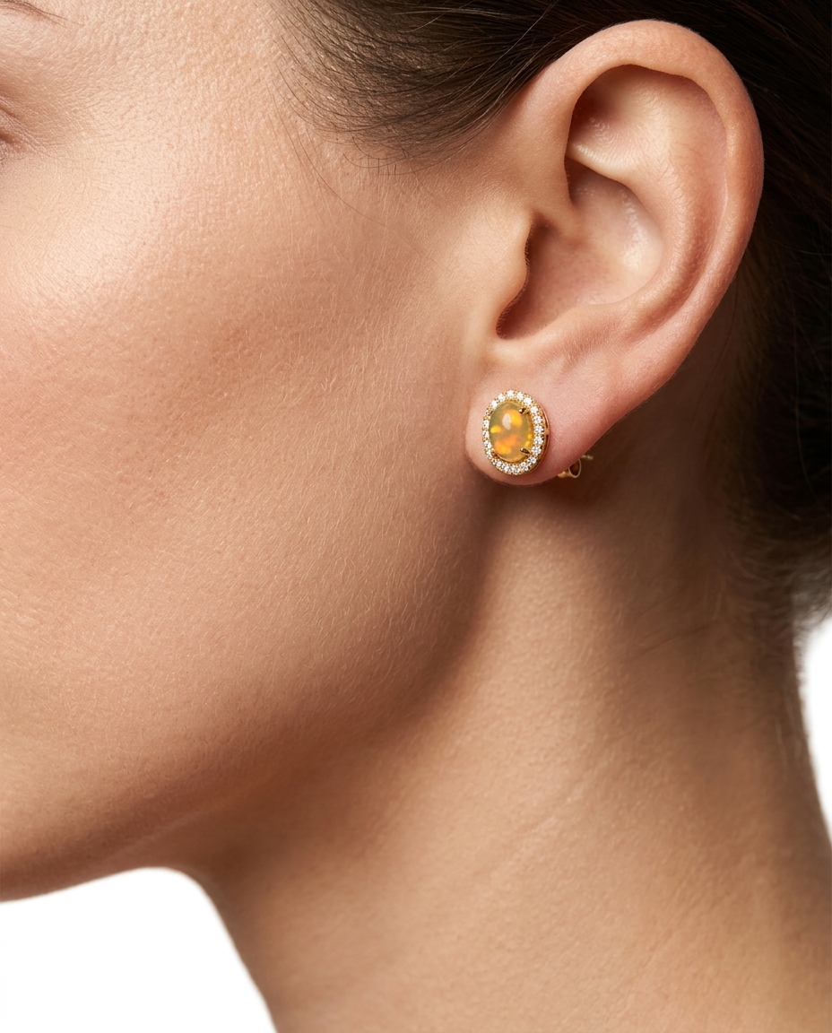14KT Gold Diamond Ethiopian Opal Oval Shape Earring on model