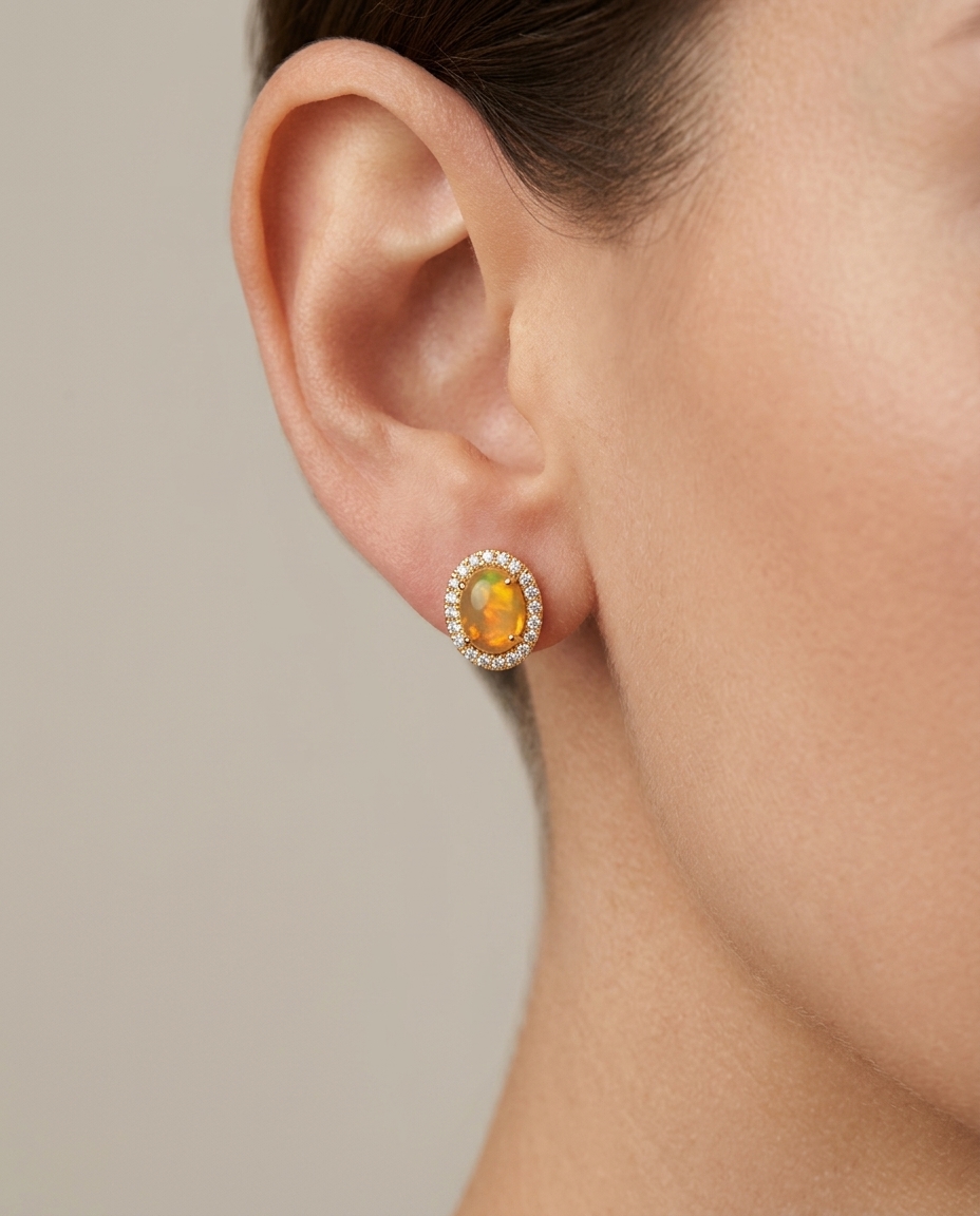 14KT Gold Diamond Ethiopian Opal Oval Shape Earring on model