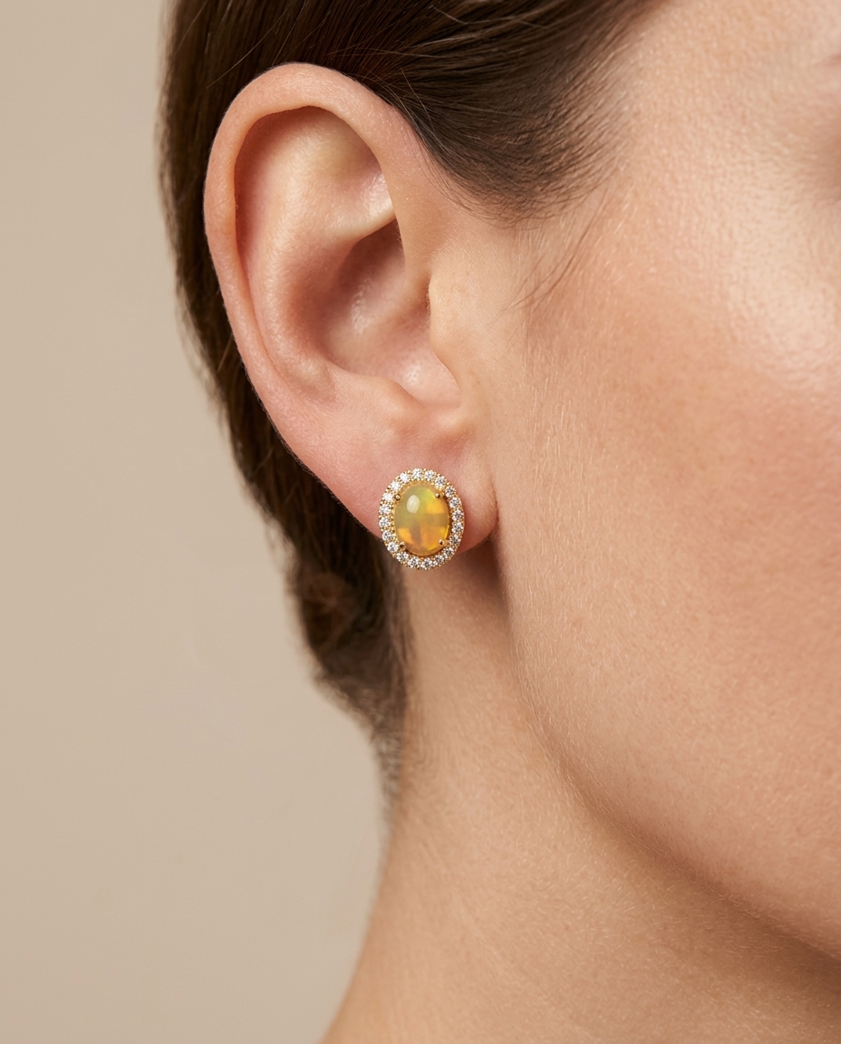 14KT Gold Diamond Ethiopian Opal Oval Shape Earring on model