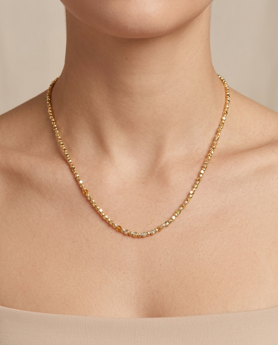14KT Gold Diamond Cut Beads Necklace on model
