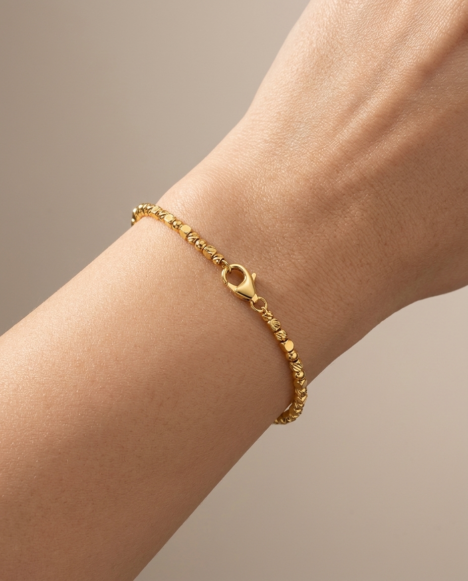 14KT Gold Diamond Cut Beads Bracelet on model