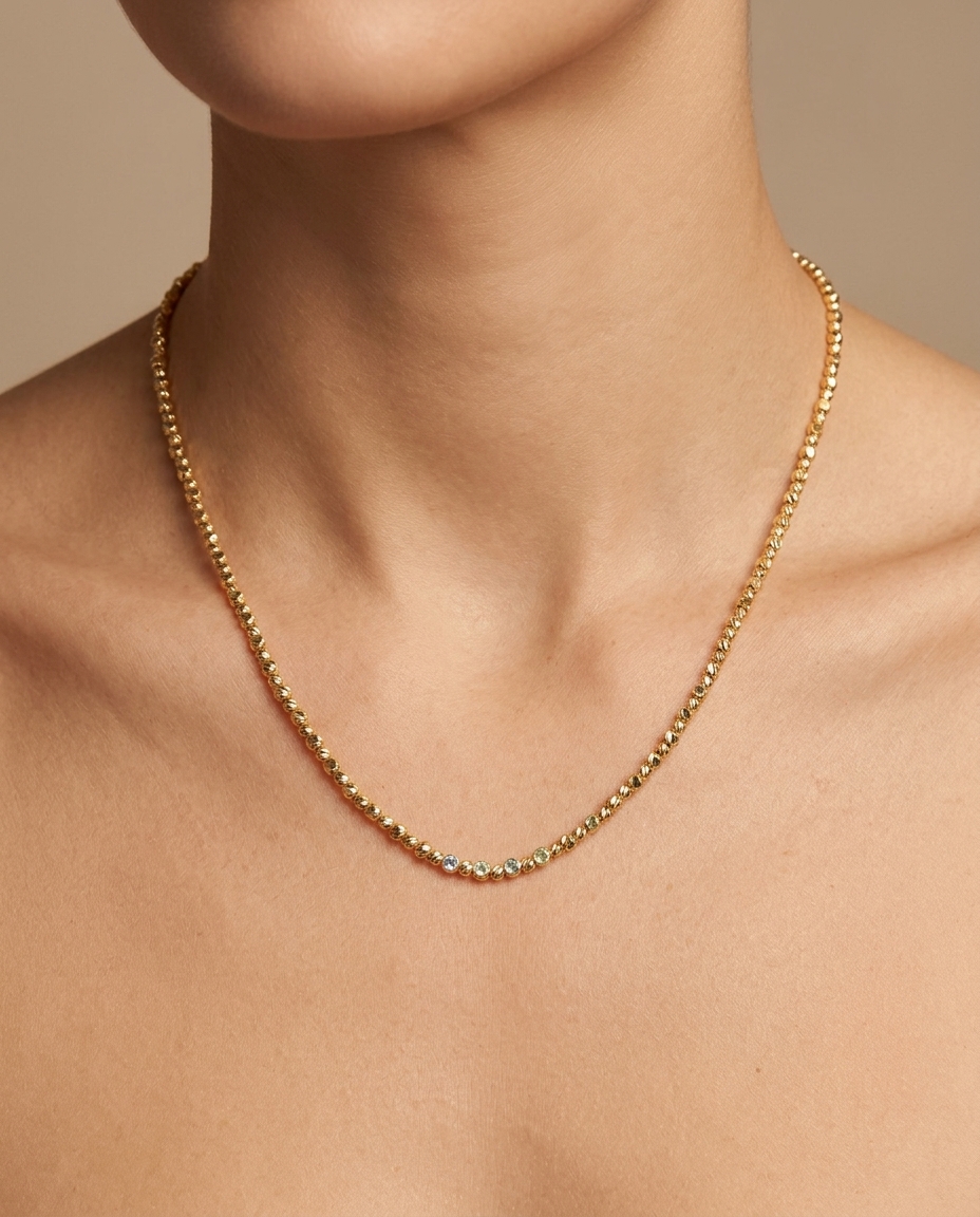 14KT Gold Diamond Cut Beads Necklace on model