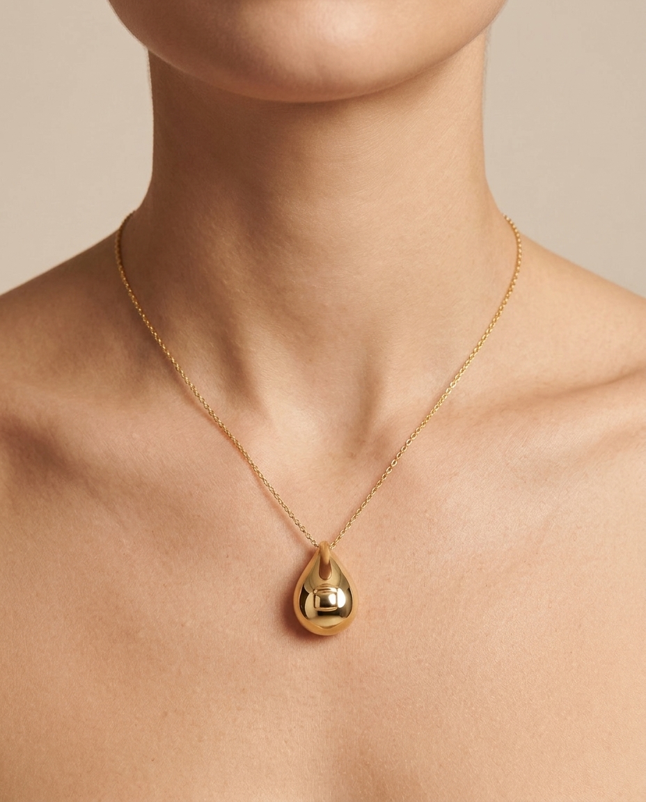 14KT Yellow Gold Round Teardrop Necklace on model