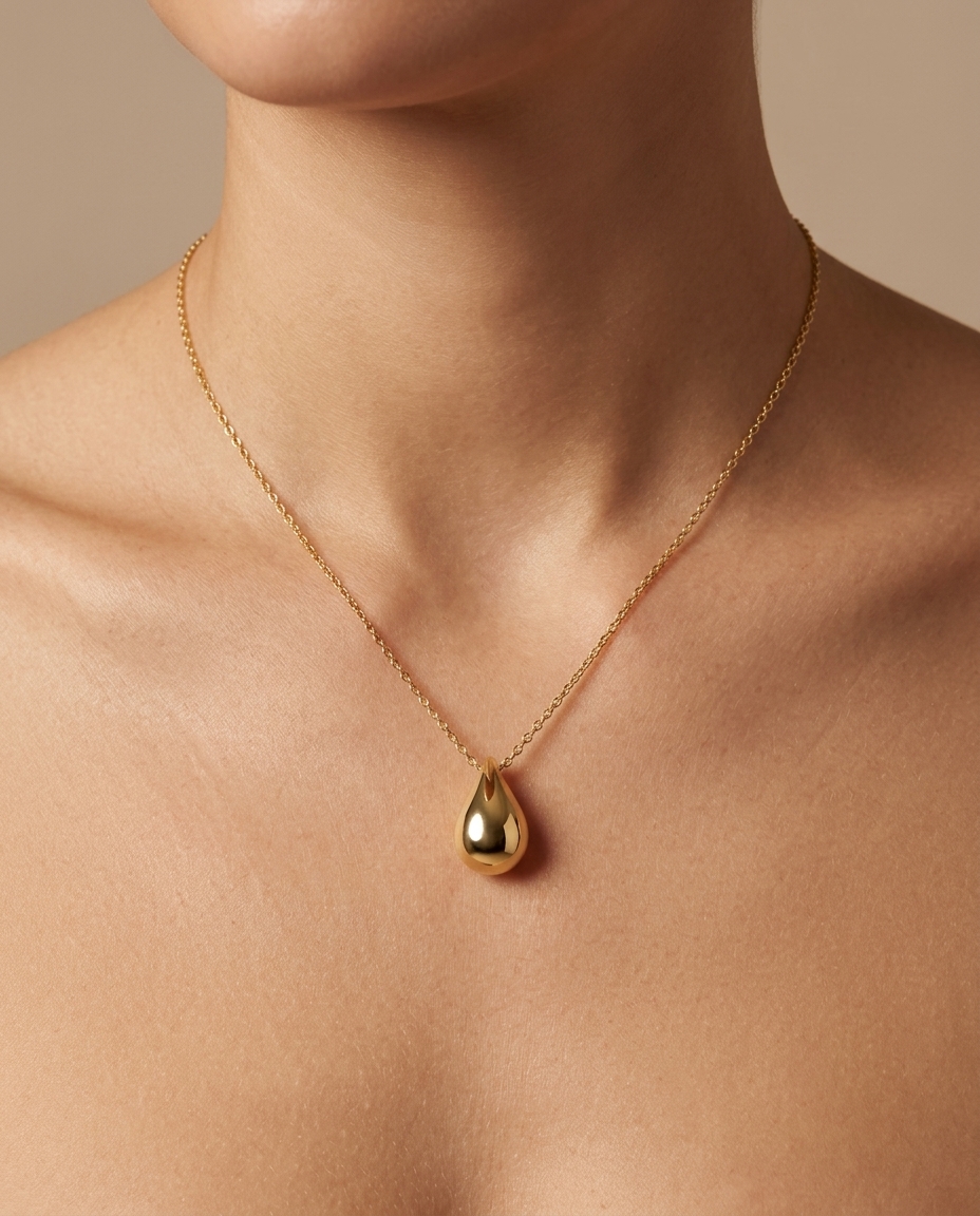 14KT Yellow Gold Round Teardrop Necklace on model