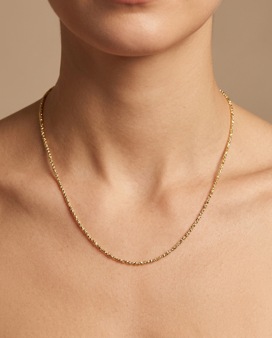 14KT Gold Diamond Cut Chain Necklace on model