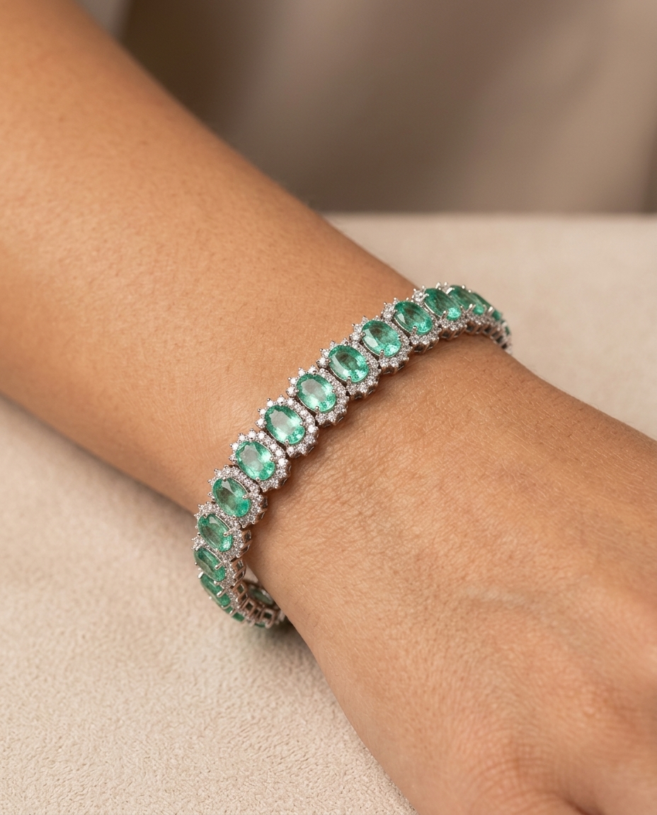18K White Gold Emerald and Diamond Bracelet on model