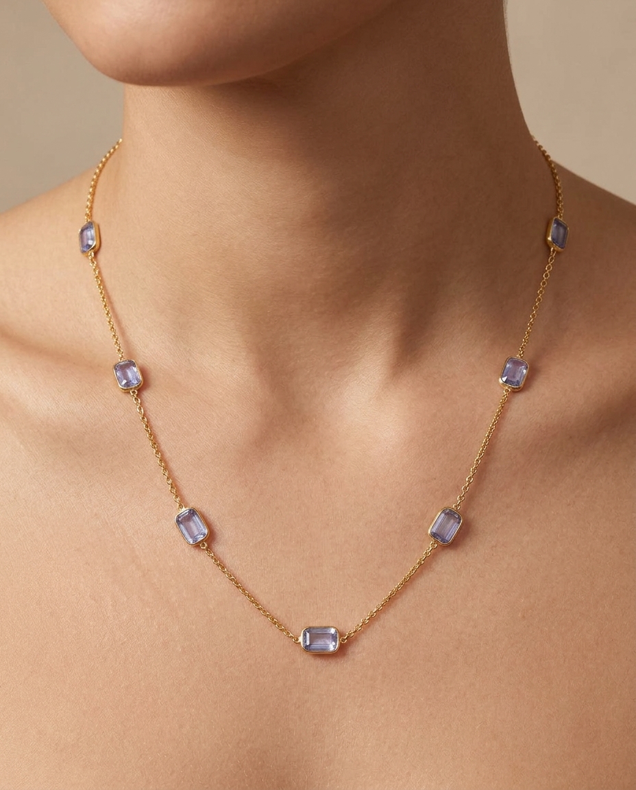 18KT Gold Bezeled Blue Sapphire Necklace on model