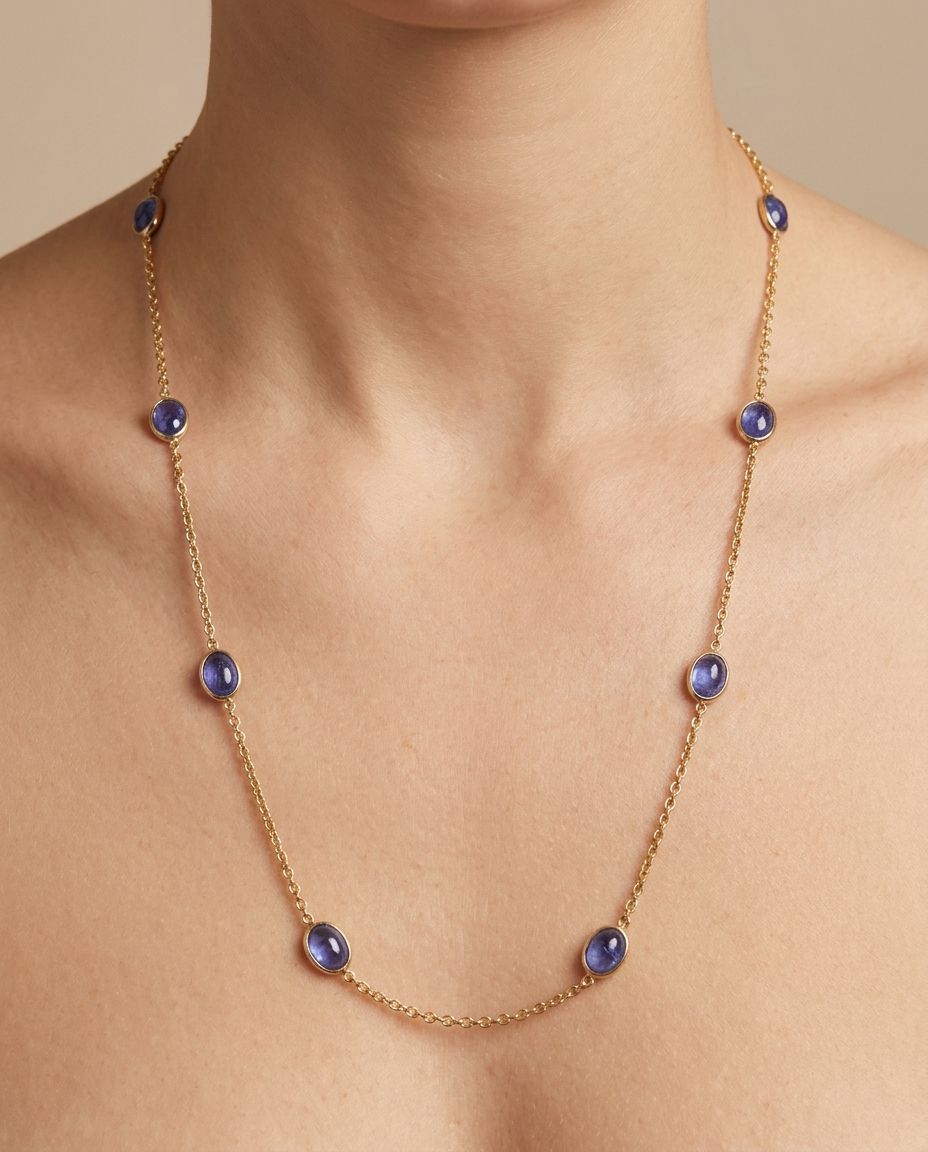 18KT Gold Bezeled Blue Sapphire Necklace on model