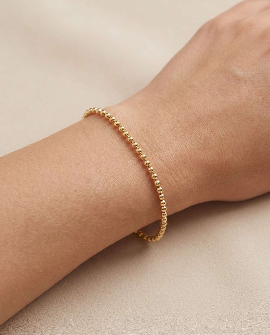 14KT Yellow Gold 2 MM Ball Bracelet 7.5" on model