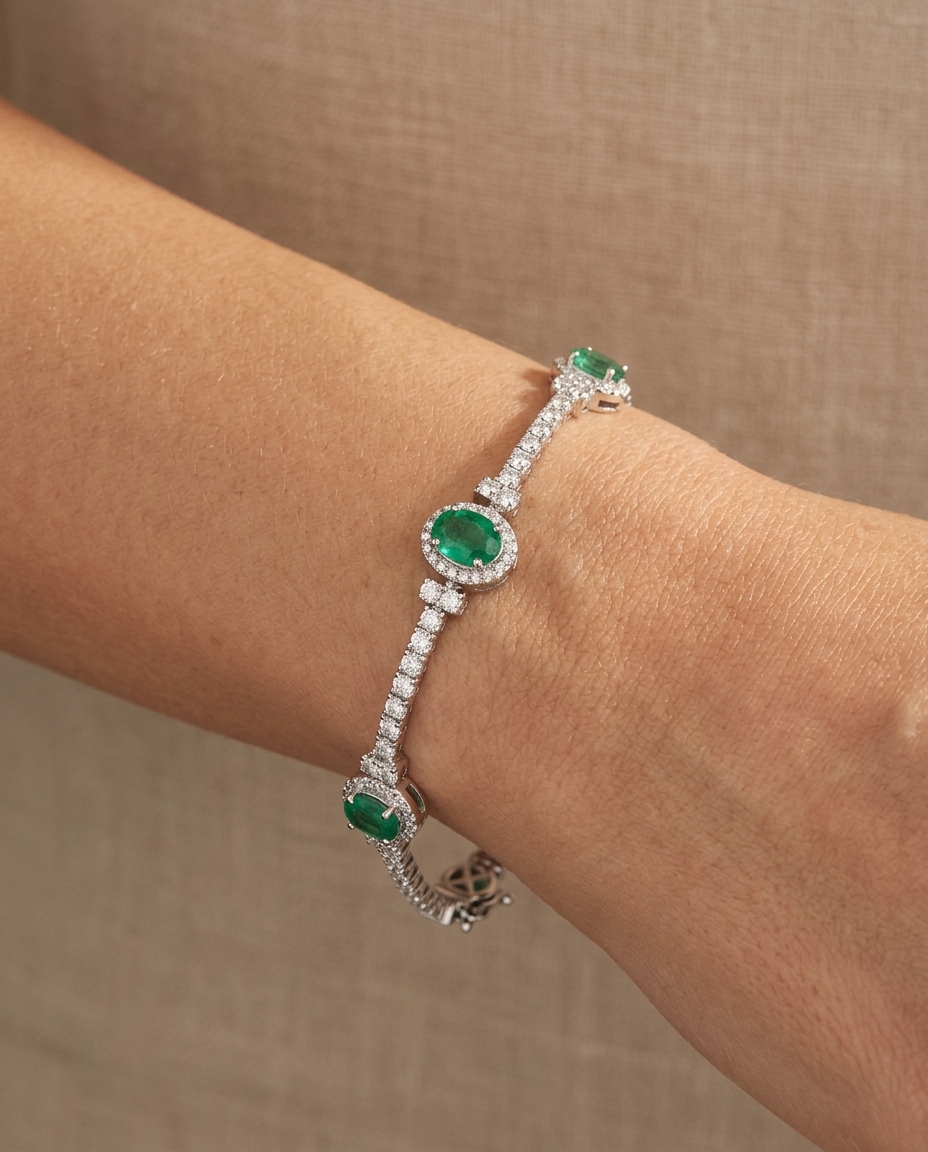 18KT White Gold Emerald and Diamonds Bracelet on model