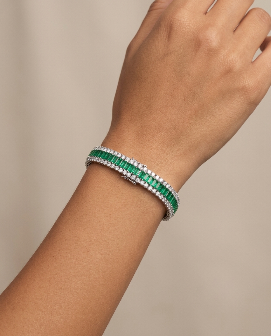 14KT White Gold Emerald and Diamonds Tennis Bracelet on model