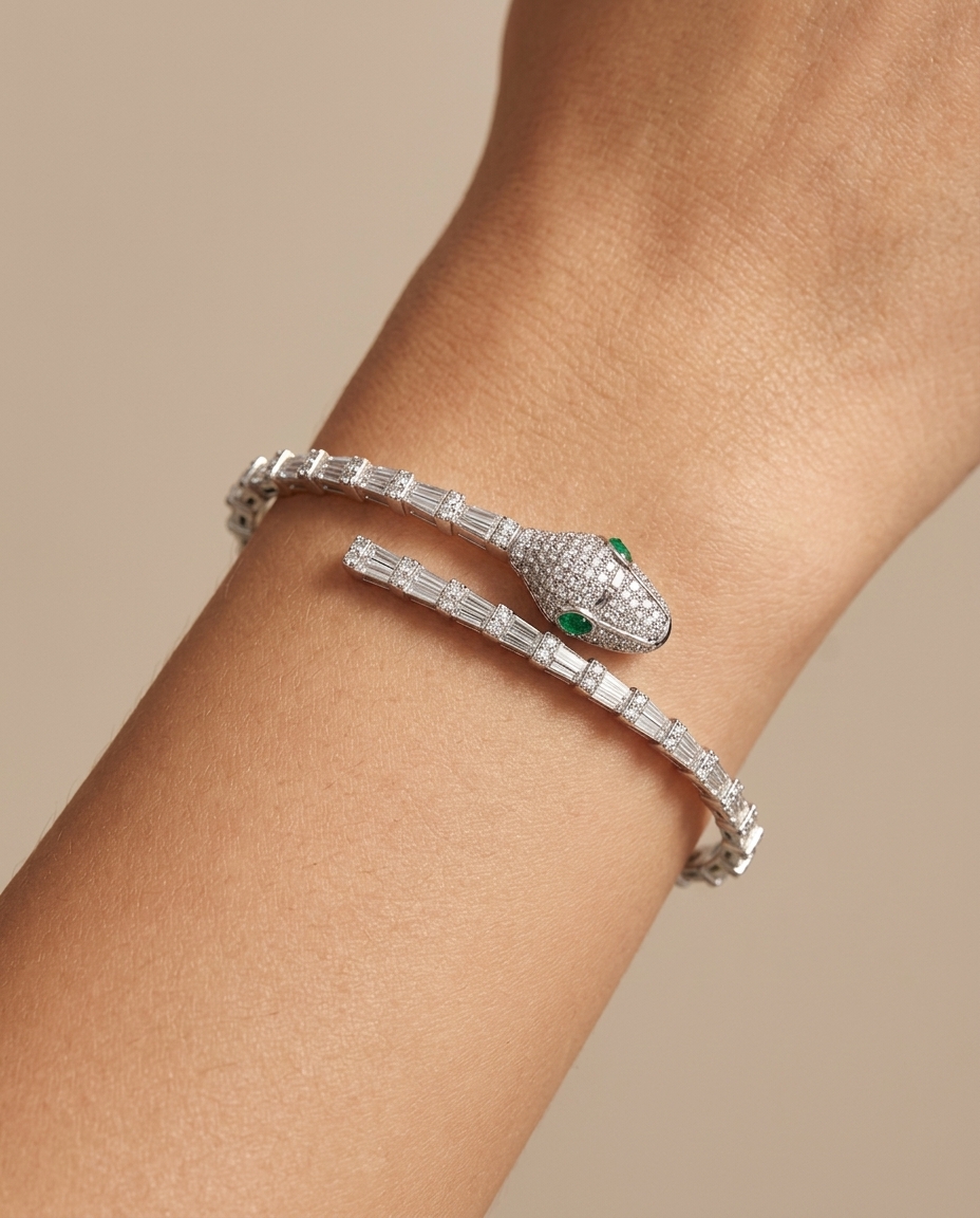 18KT White Gold Emerald and Diamonds Snake Bangle on model