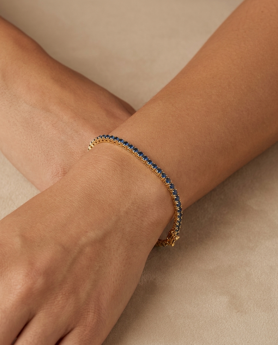 14KT Yellow Gold Blue Sapphire Tennis Bracelet on model