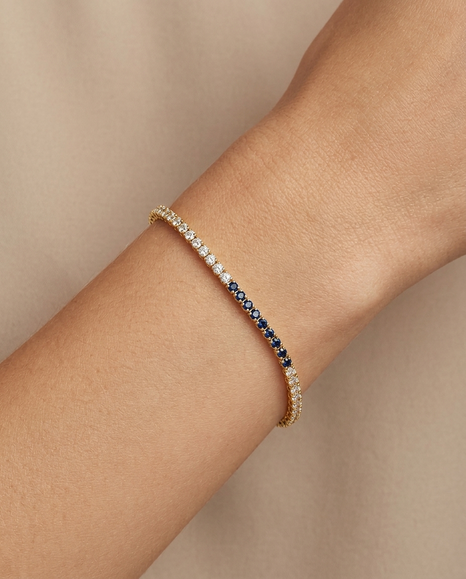 14KT Gold White and Blue Sapphire Tennis Bracelet on model