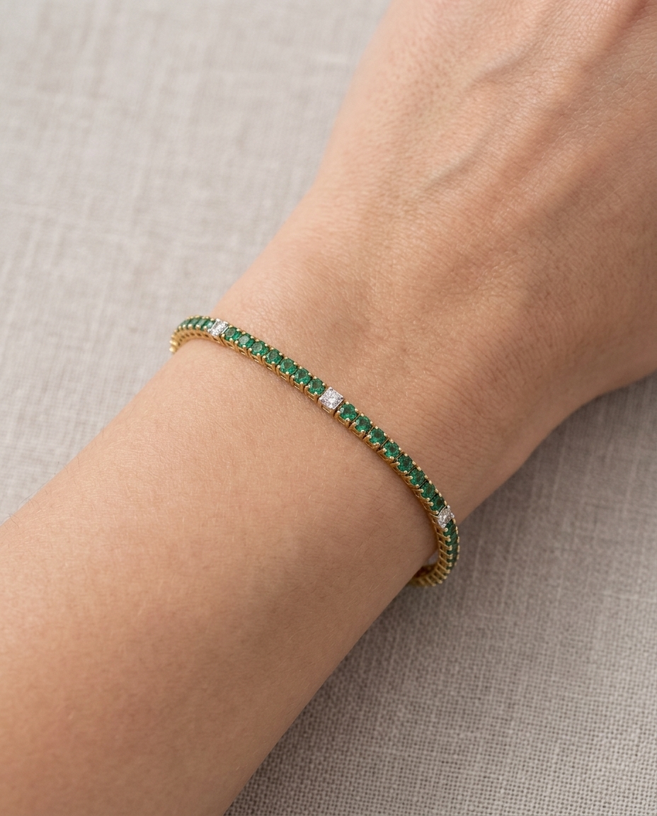 18K Yellow Gold Emerald and Diamond Tennis Bracelet on model