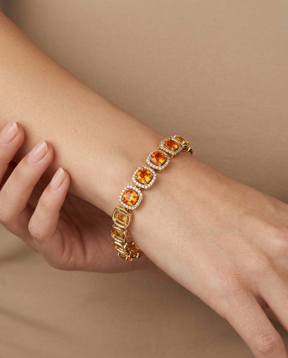 14KT Gold Cushion Shape Orange Sapphire Diamond Bracelet on model