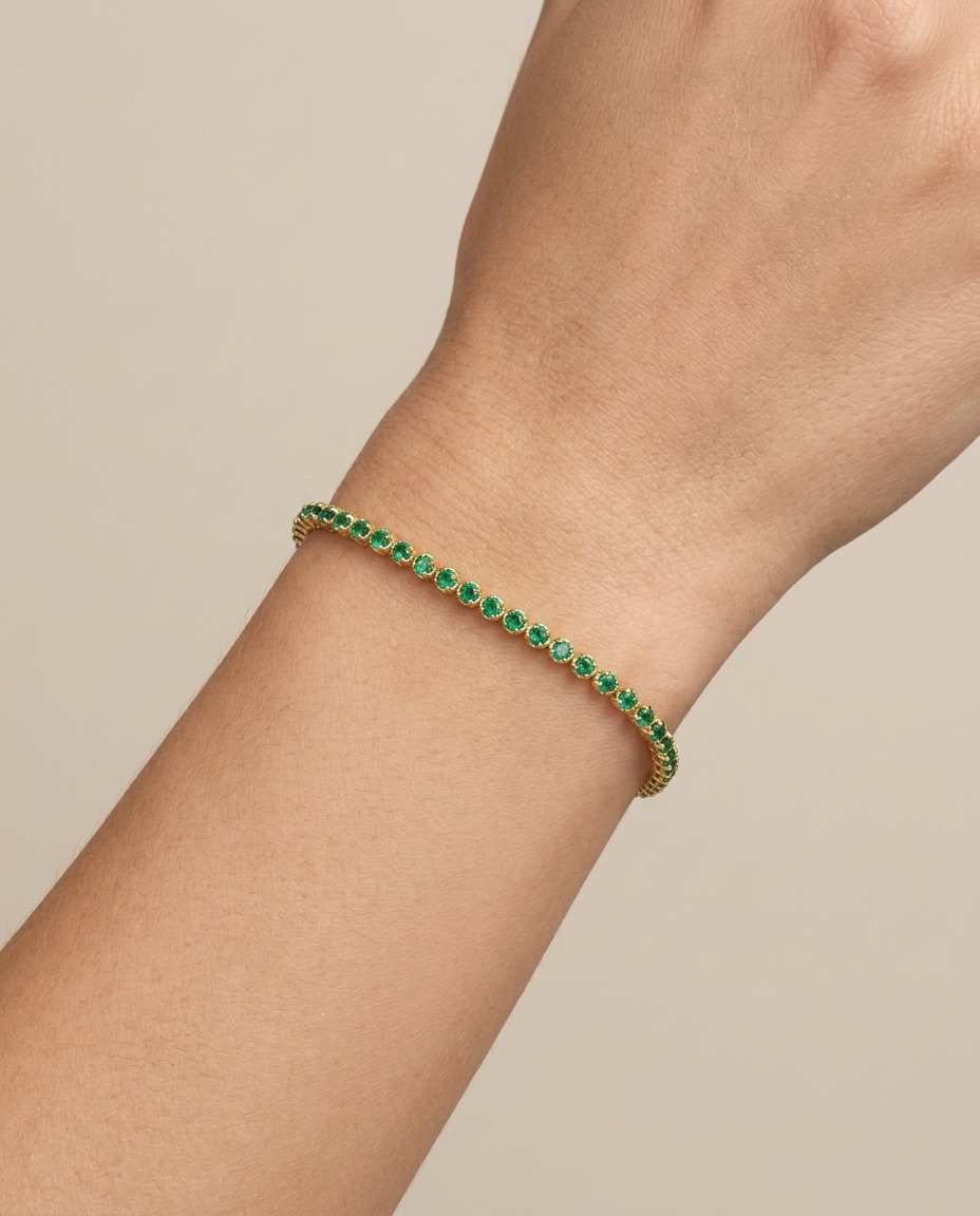 14KT Gold Emerald Tennis Bracelet on model