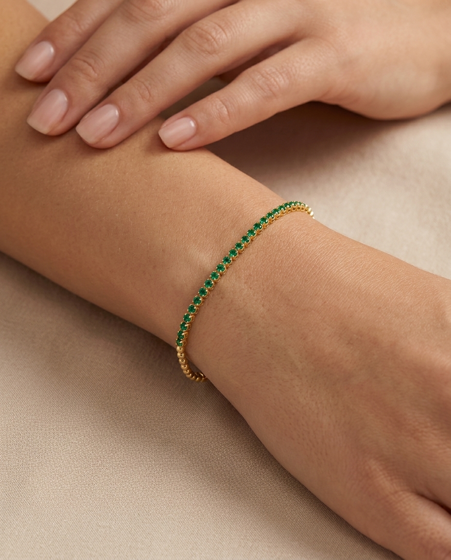14KT Gold Emerald Tennis Bracelet on model