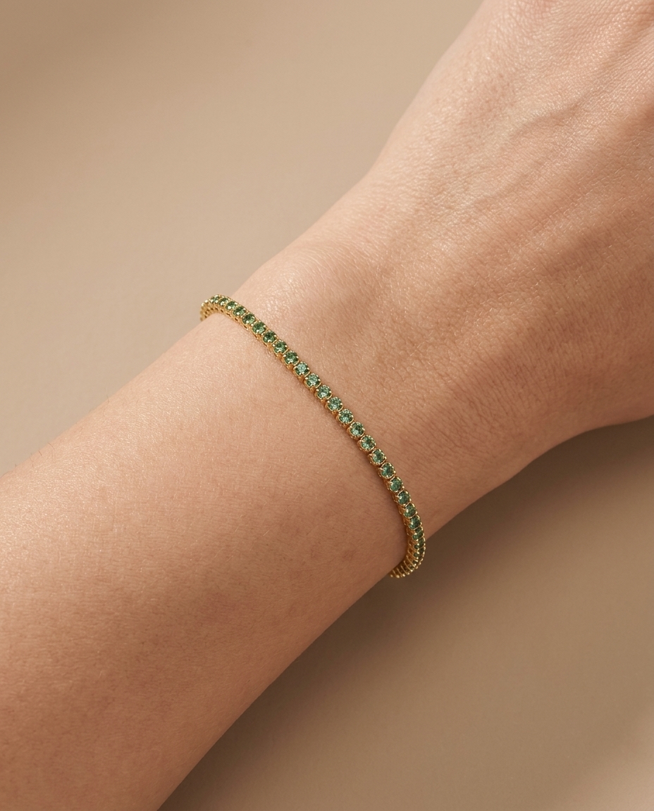 14KT Yellow Gold Emerald Tennis Bracelet on model