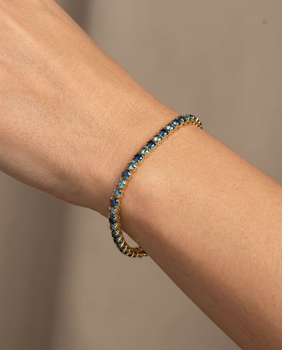 14KT Gold Blue Diamonds Tennis Bracelet 2.00 Cts on model