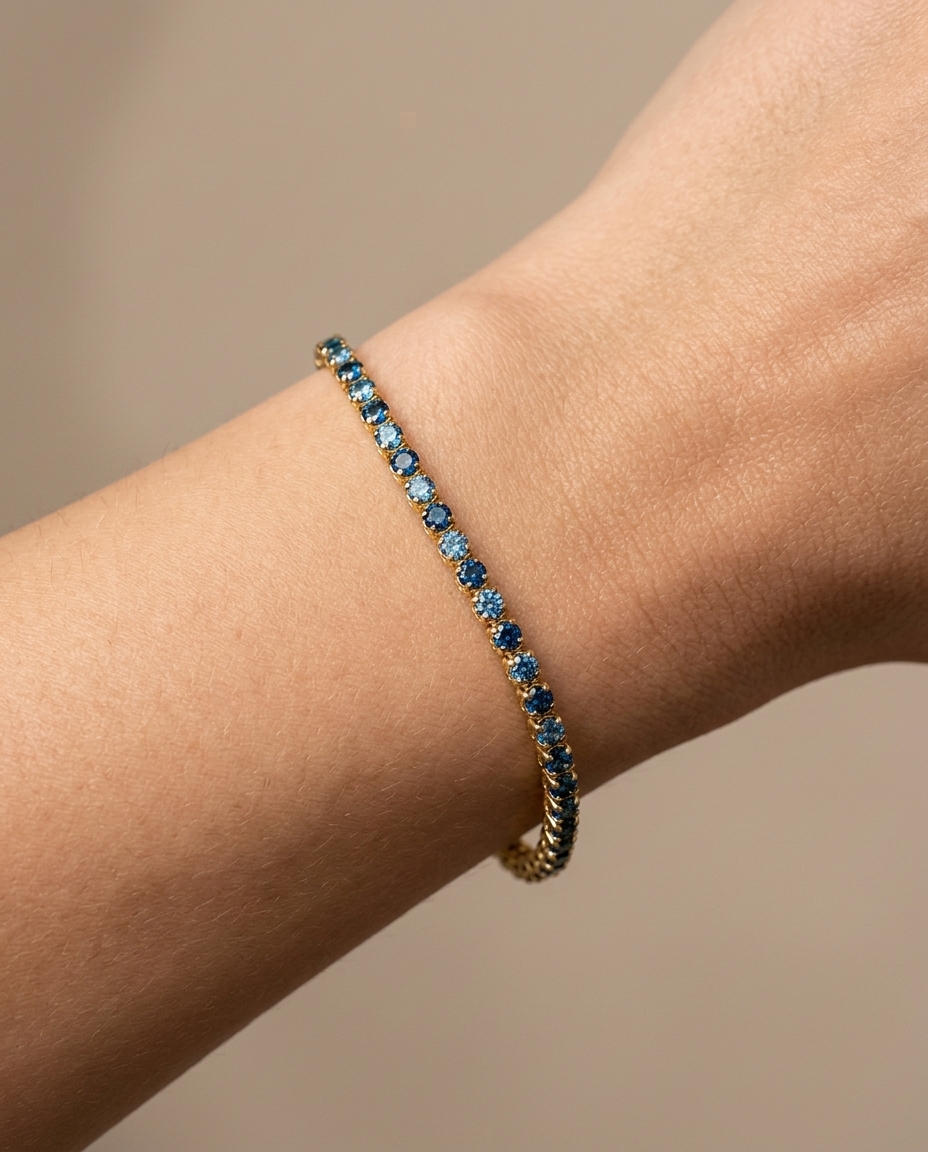 14KT Gold Blue Diamonds Tennis Bracelet 3.00 Cts on model