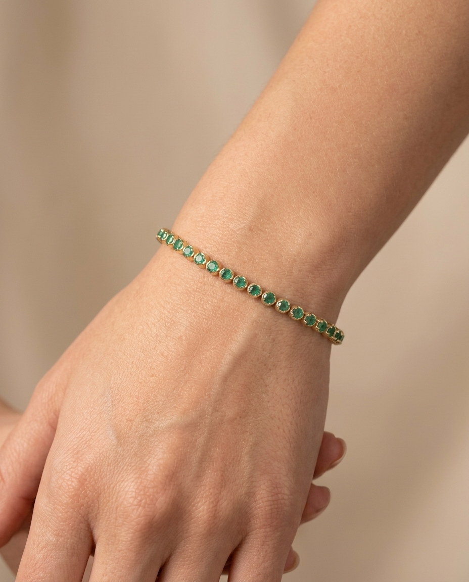 14KT Gold Emerald Bracelet 4.00 Cts on model