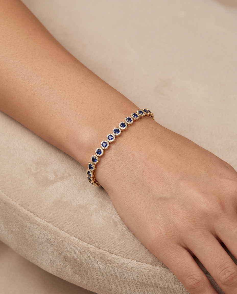 14KT Gold Blue Sapphire and Diamonds Tennis Bracelet on model