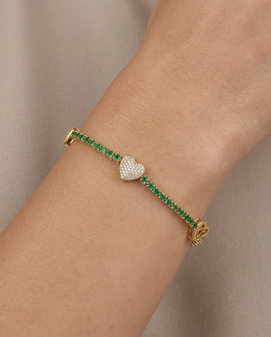14KT Gold Emerald and Diamonds Heart Tennis Bracelet on model