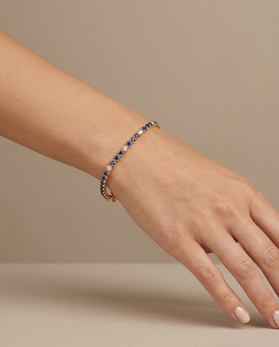 14KT Gold Diamond and Blue Sapphire Bracelet on model