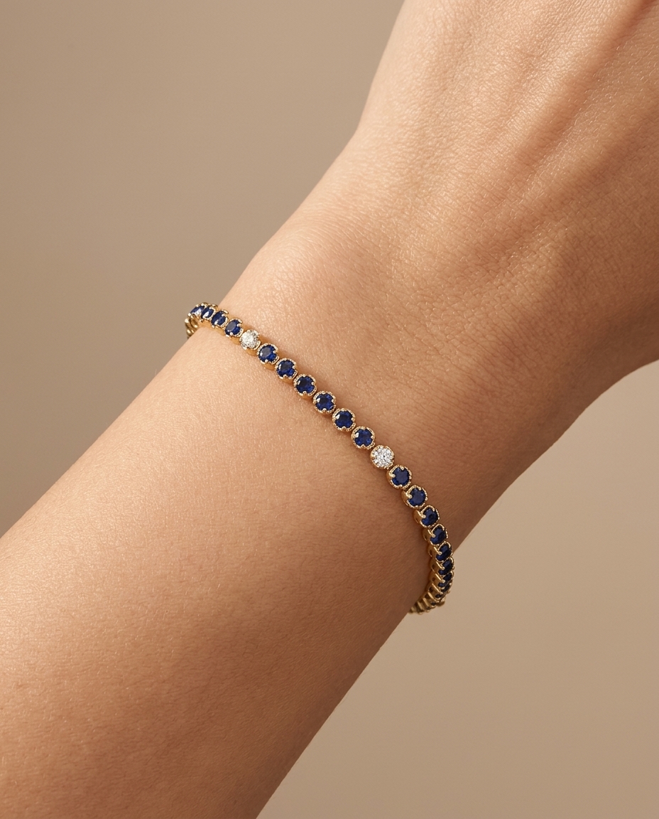 14KT Gold Diamond and Blue Sapphire Bracelet on model