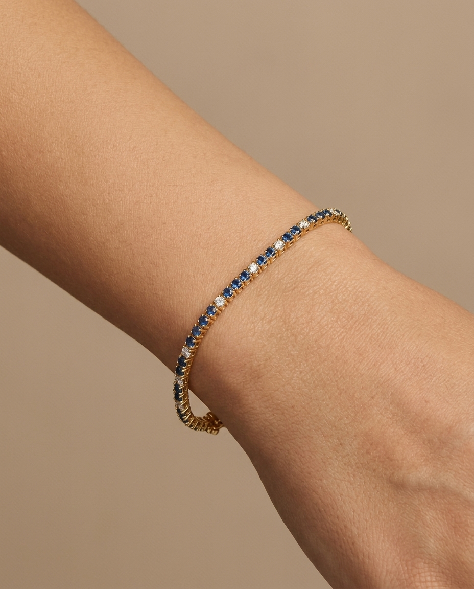 14KT Yellow Gold Blue Sapphire and Diamond Tennis Bracelet on model