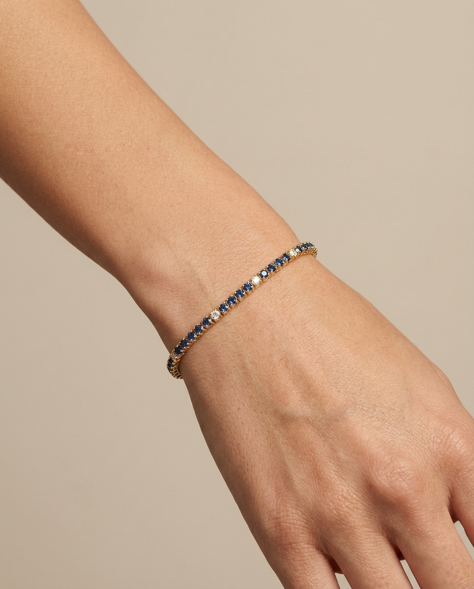 14KT Yellow Gold Blue Sapphire and Diamond Tennis Bracelet on model