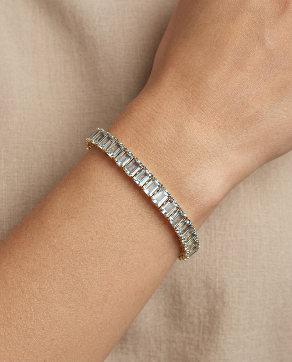 14KT Yellow Gold Aquamarine Tennis Bracelet on model