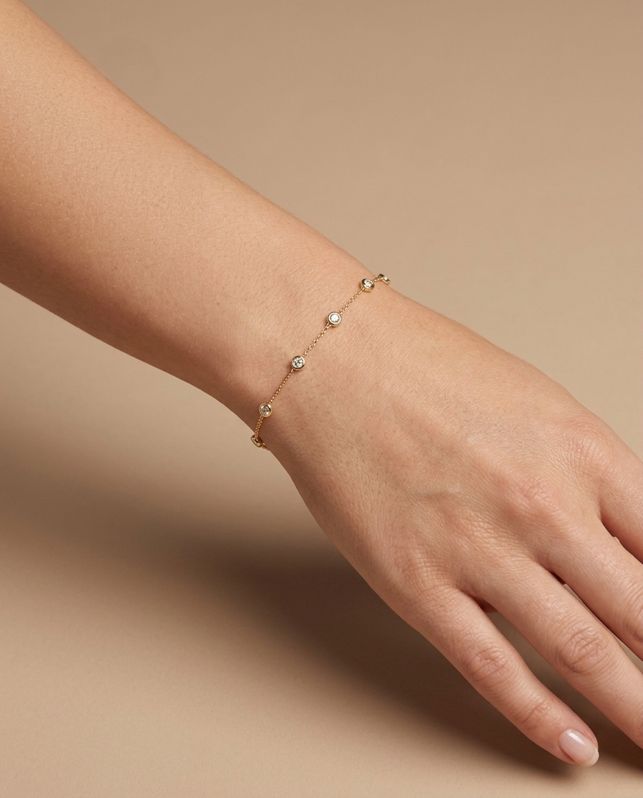 14KT Gold Bezeled Diamond Station Bracelet on model