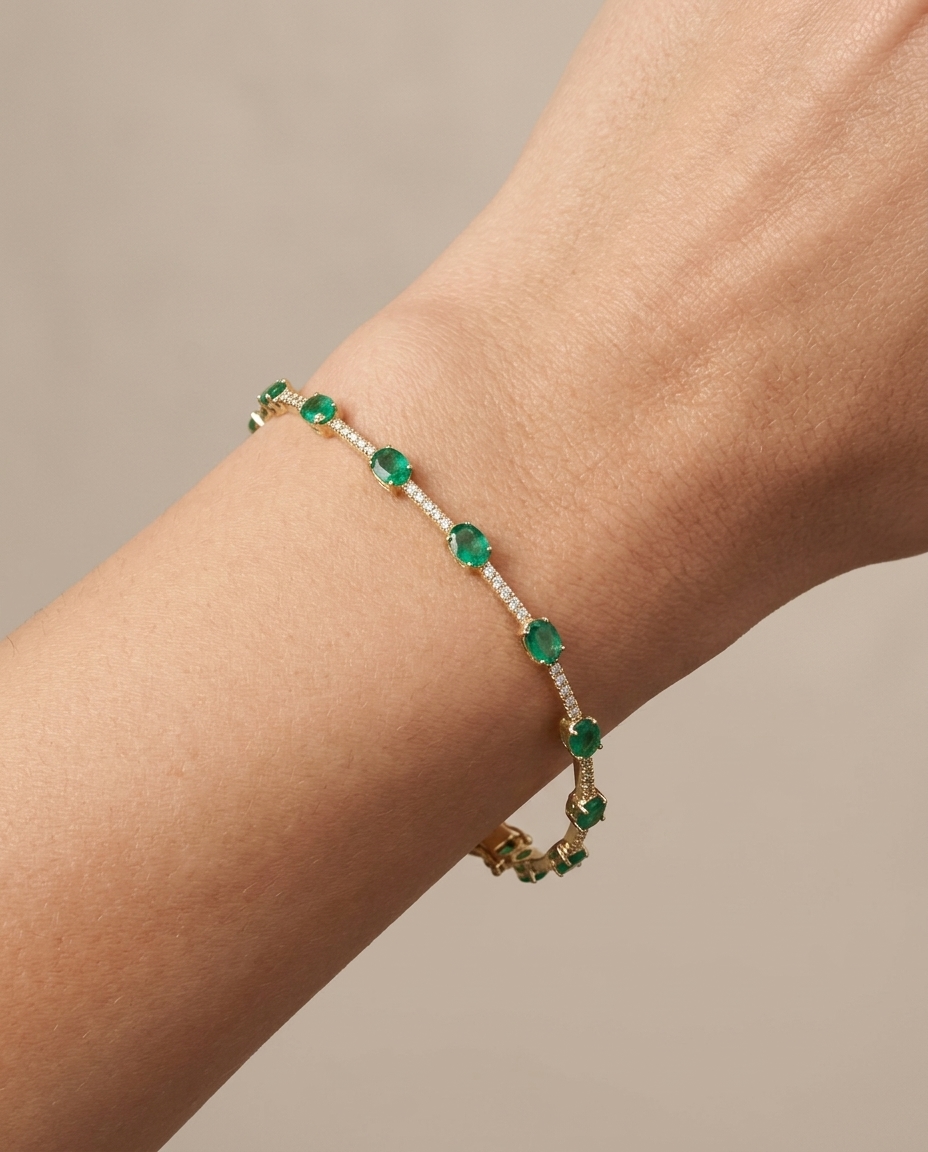 18KT Yellow Gold Emerald and Diamonds Bracelet on model
