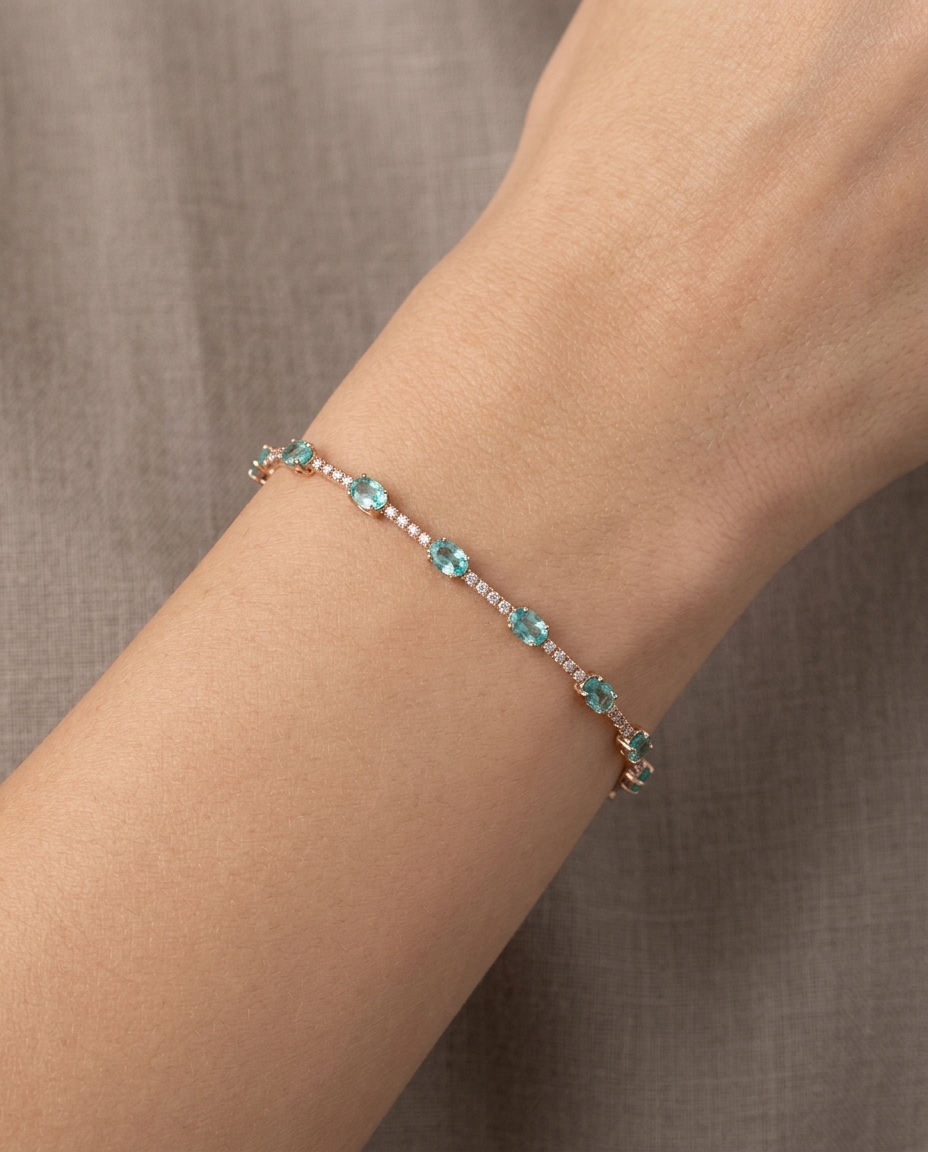 18KT Rose Gold Emerald and Diamonds Bracelet on model