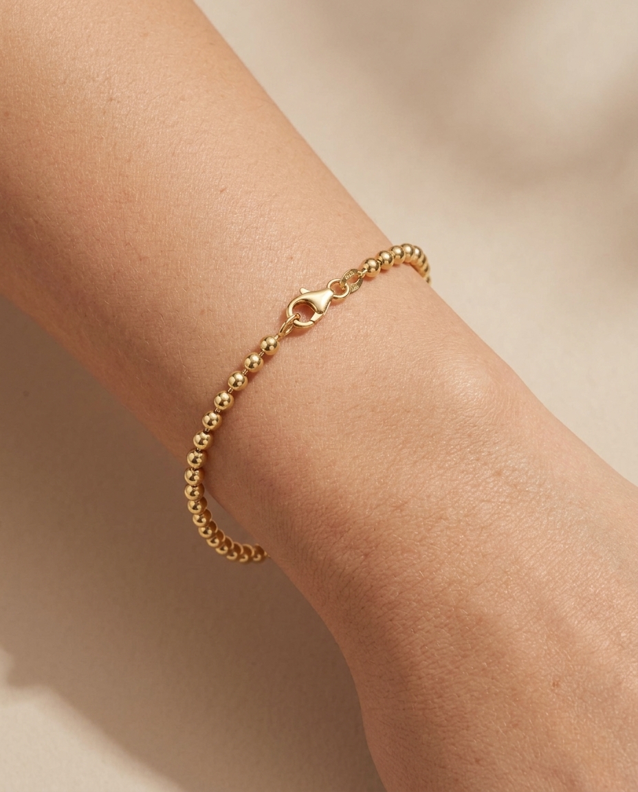14KT Gold Ball Bracelet on model