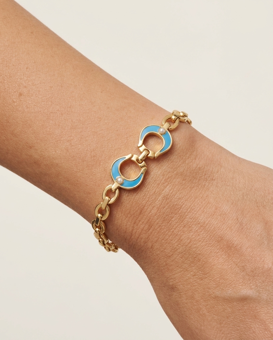 14KT Gold Chain Link Bracelet with Turquoise Horseshoe on model