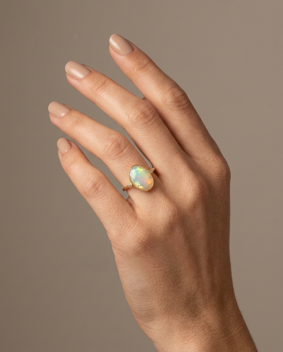 18KT Gold Opal and Diamond Ring on model