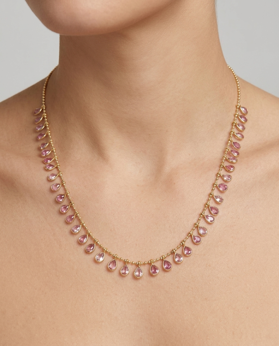 14KT Yellow Gold Pear Shape Pink Sapphire Dangling Necklace on model