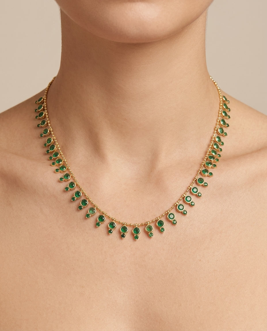 14KT Yellow Gold Pear Shape Emerald Dangling Necklace on model