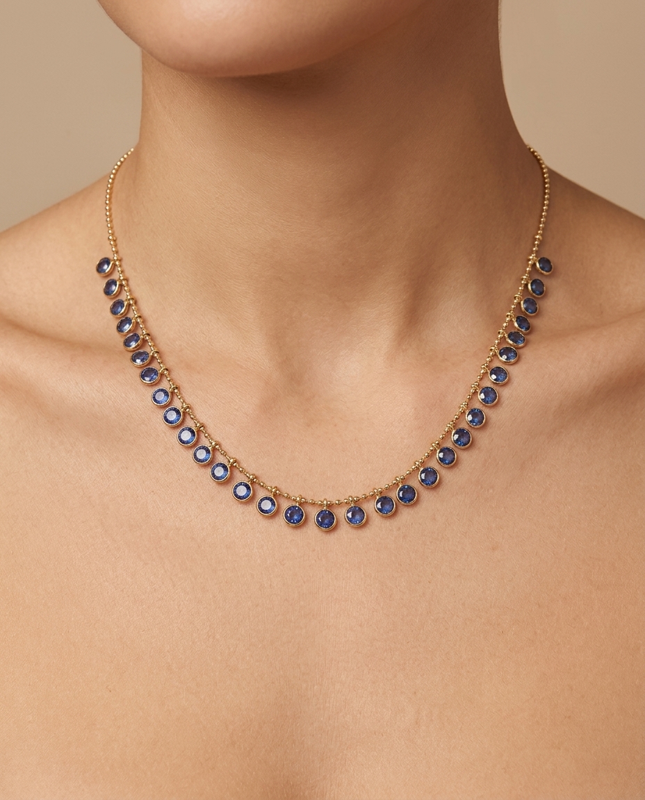 14KT Yellow Gold Round Shape Sapphire Dangling Necklace on model